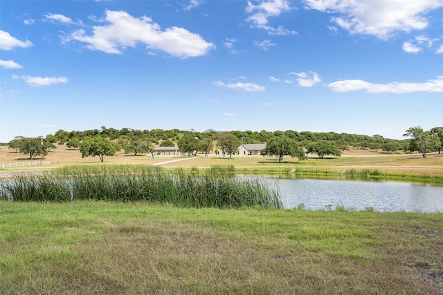 view of water feature with a rural view