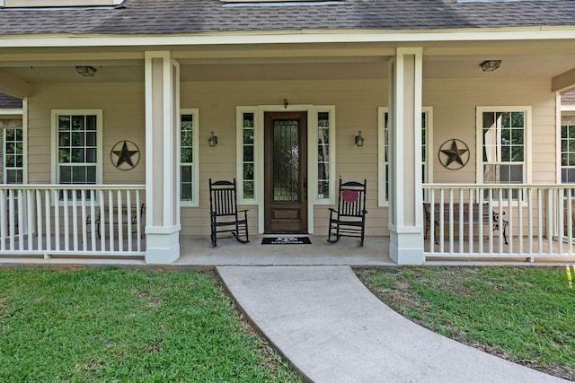 property entrance featuring a porch