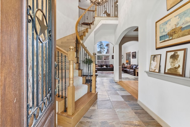 entrance foyer featuring a high ceiling