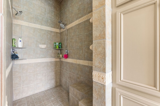 bathroom with tiled shower