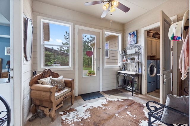 interior space featuring washer / clothes dryer and ceiling fan