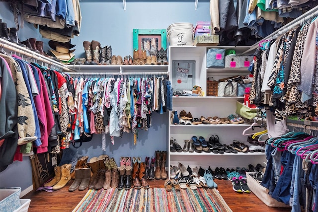 walk in closet featuring hardwood / wood-style flooring