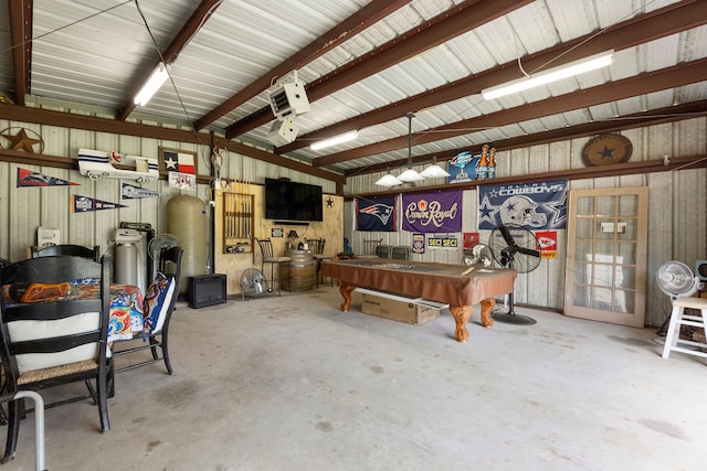 garage featuring wooden walls