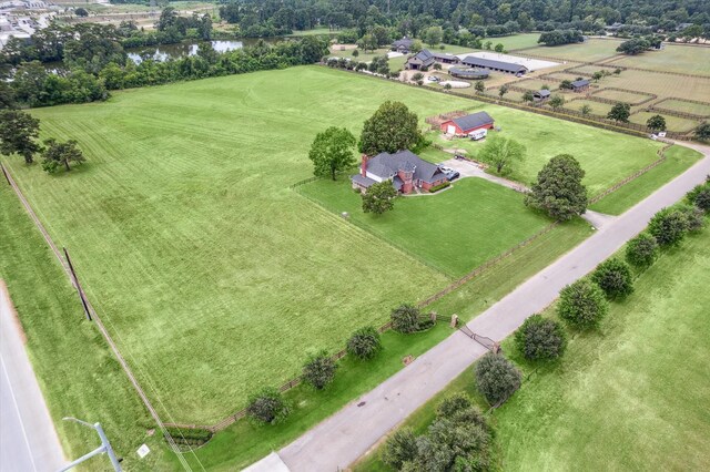 bird's eye view featuring a water view and a rural view