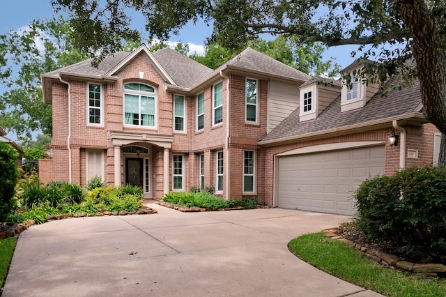 view of front of property with a garage