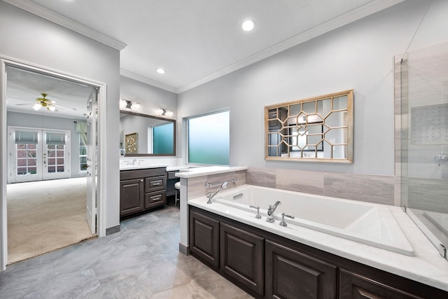 bathroom featuring vanity, crown molding, a textured ceiling, and shower with separate bathtub