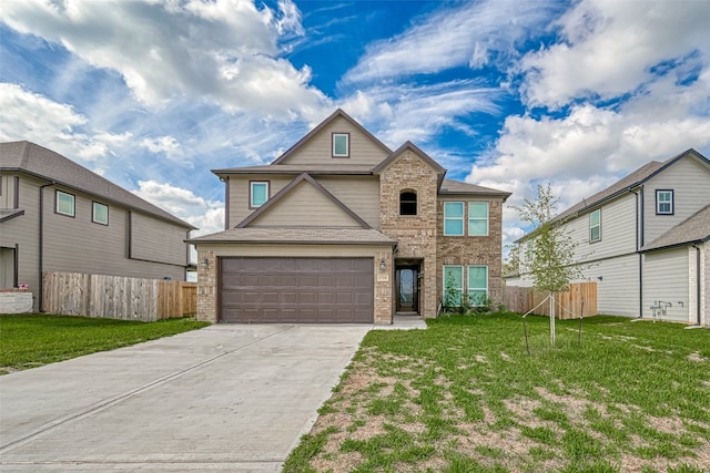 view of front of home featuring a front yard and a garage