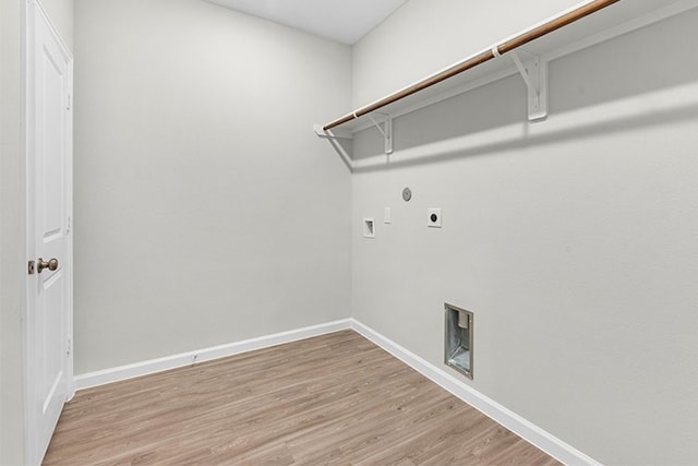 washroom featuring washer hookup, electric dryer hookup, and wood-type flooring