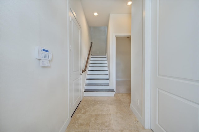 hall featuring stairs and recessed lighting