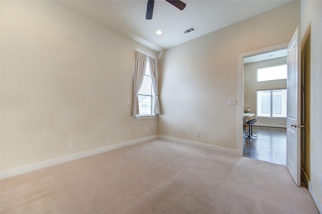 carpeted empty room with baseboards, visible vents, a ceiling fan, and recessed lighting