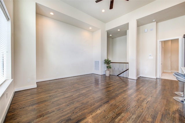 unfurnished room with recessed lighting, visible vents, ceiling fan, wood finished floors, and baseboards