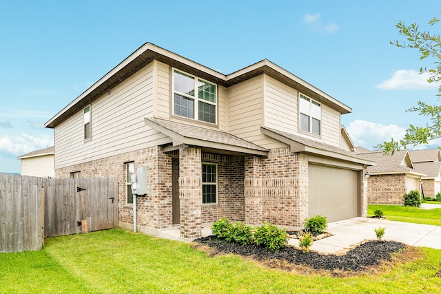 view of front facade with a garage and a front lawn