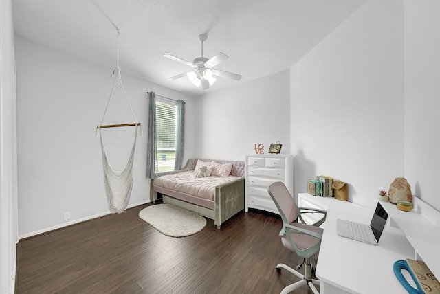 bedroom featuring dark wood-type flooring and ceiling fan