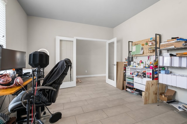 office area featuring french doors and light tile patterned flooring