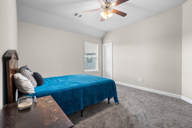 bedroom featuring lofted ceiling, dark carpet, and ceiling fan