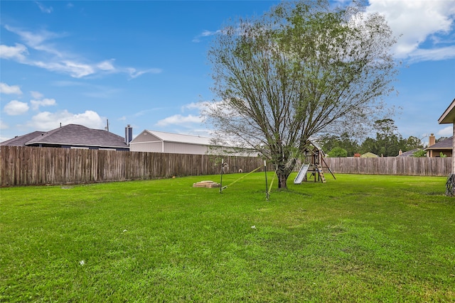 view of yard featuring a playground