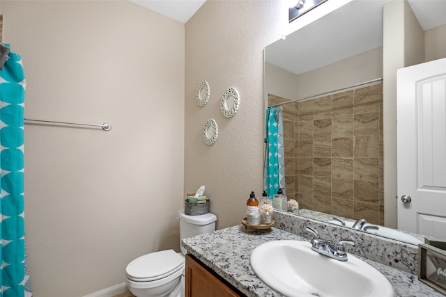 bathroom with toilet, a shower with curtain, and vanity