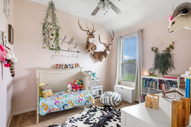 bedroom featuring lofted ceiling, carpet flooring, and ceiling fan