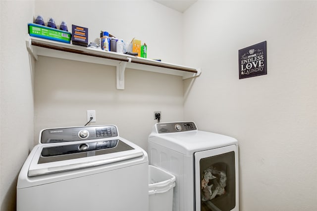 washroom with separate washer and dryer