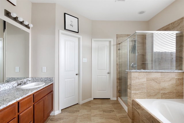 bathroom with vanity and plus walk in shower