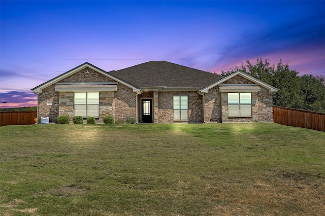 view of front facade with a lawn