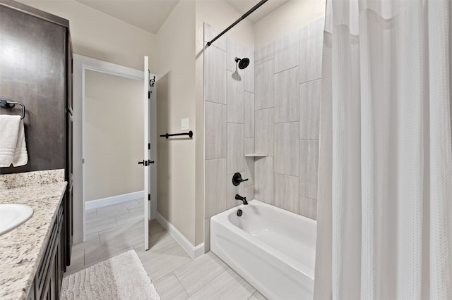 bathroom featuring shower / bath combination with curtain and vanity