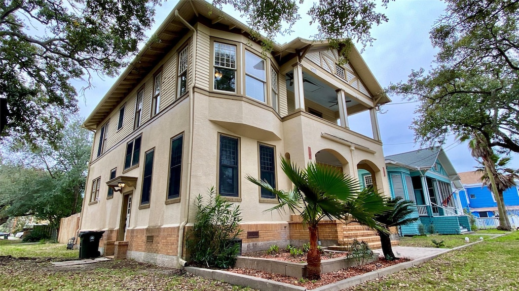 view of home's exterior featuring a balcony