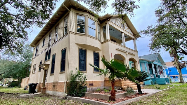 view of home's exterior featuring a balcony