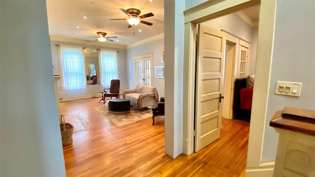 1804 33rd St, Galveston, TX 77550 - corridor with light wood-style floors, ornamental molding, and recessed lighting