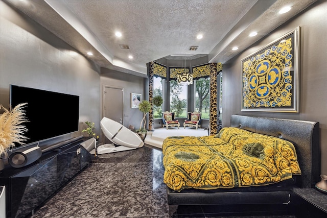 bedroom with recessed lighting, visible vents, granite finish floor, and a textured ceiling