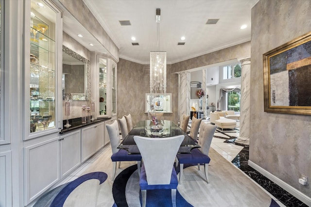 dining room featuring marble finish floor, ornamental molding, and recessed lighting