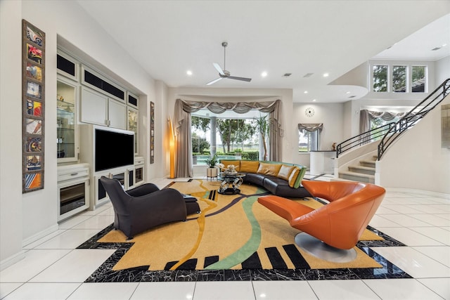 living room with stairs, light tile patterned floors, recessed lighting, and baseboards