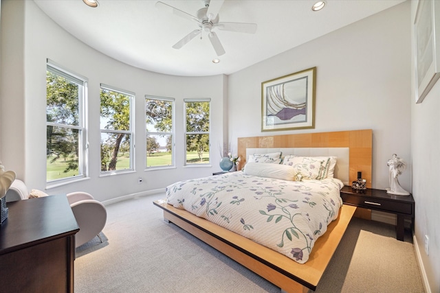 bedroom with baseboards, carpet floors, multiple windows, and recessed lighting