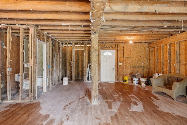 interior space with hardwood / wood-style floors