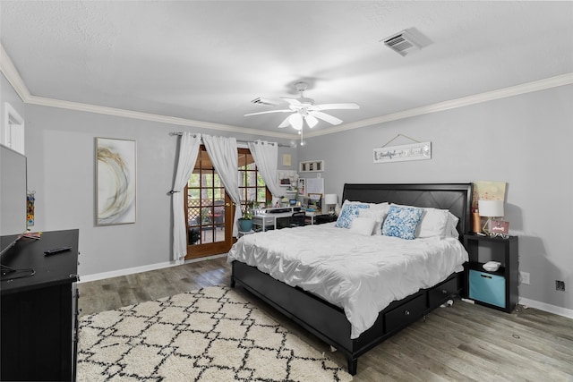 bedroom with light wood-type flooring, ornamental molding, access to exterior, and ceiling fan