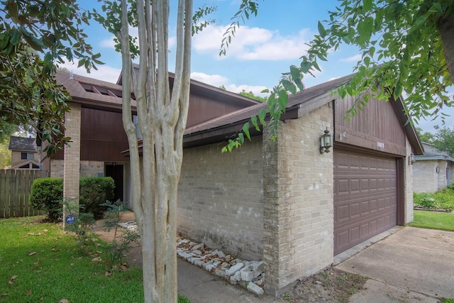 view of home's exterior featuring a garage