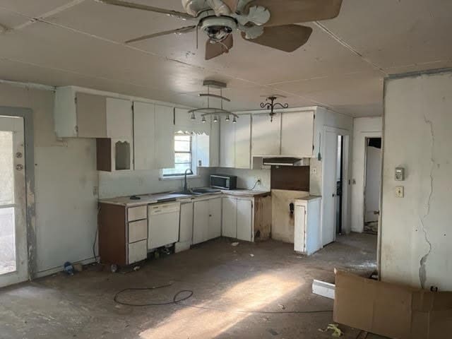 kitchen with ceiling fan, dishwasher, hanging light fixtures, and white cabinetry