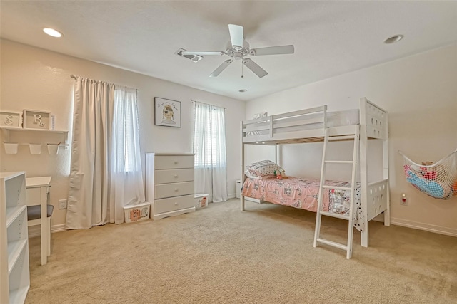 carpeted bedroom featuring ceiling fan