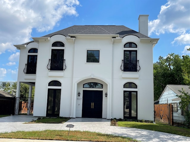 view of french country inspired facade