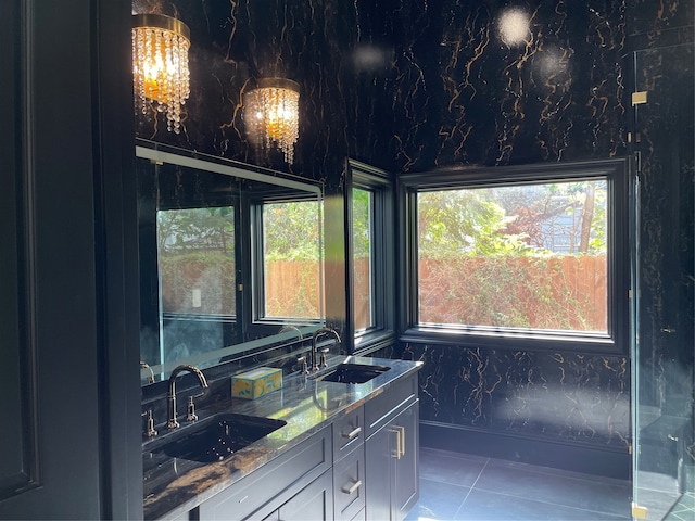 bathroom with vanity and tile patterned floors