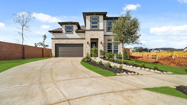 prairie-style home with a garage