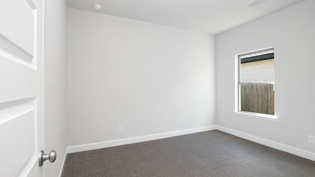 unfurnished room with carpet