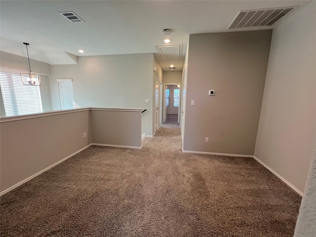 empty room with carpet flooring