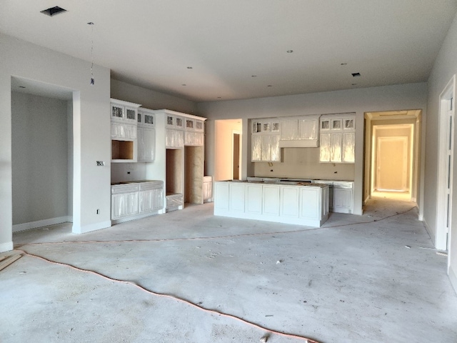 kitchen featuring white cabinetry and a center island