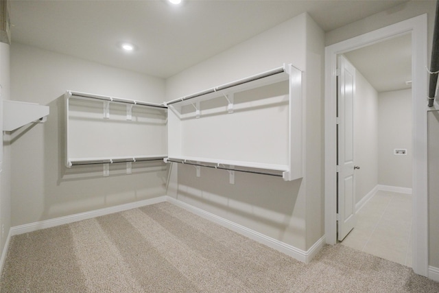 9715 Hunters Run Dr, Missouri City, TX 77459 - walk in closet featuring carpet