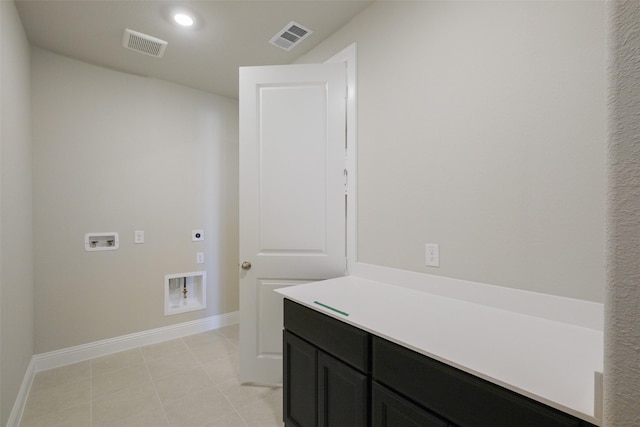 9715 Hunters Run Dr, Missouri City, TX 77459 - washroom featuring washer hookup, baseboards, visible vents, and hookup for an electric dryer