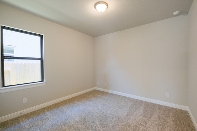 9715 Hunters Run Dr, Missouri City, TX 77459 - carpeted empty room with baseboards