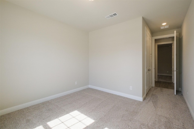 9715 Hunters Run Dr, Missouri City, TX 77459 - empty room with baseboards, visible vents, and light carpet