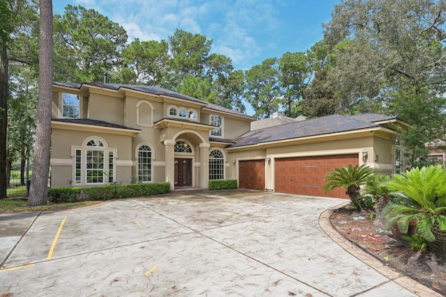 view of front of home with a garage