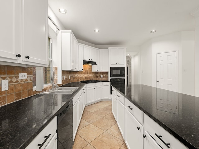 kitchen featuring white cabinets, sink, dark stone counters, and black appliances